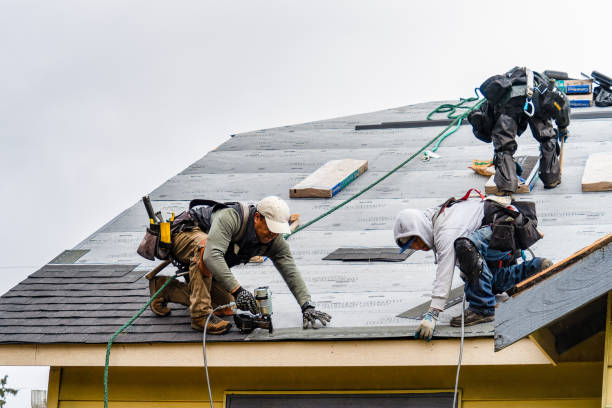 Professional Roof Installation technician working in Taftville, CT